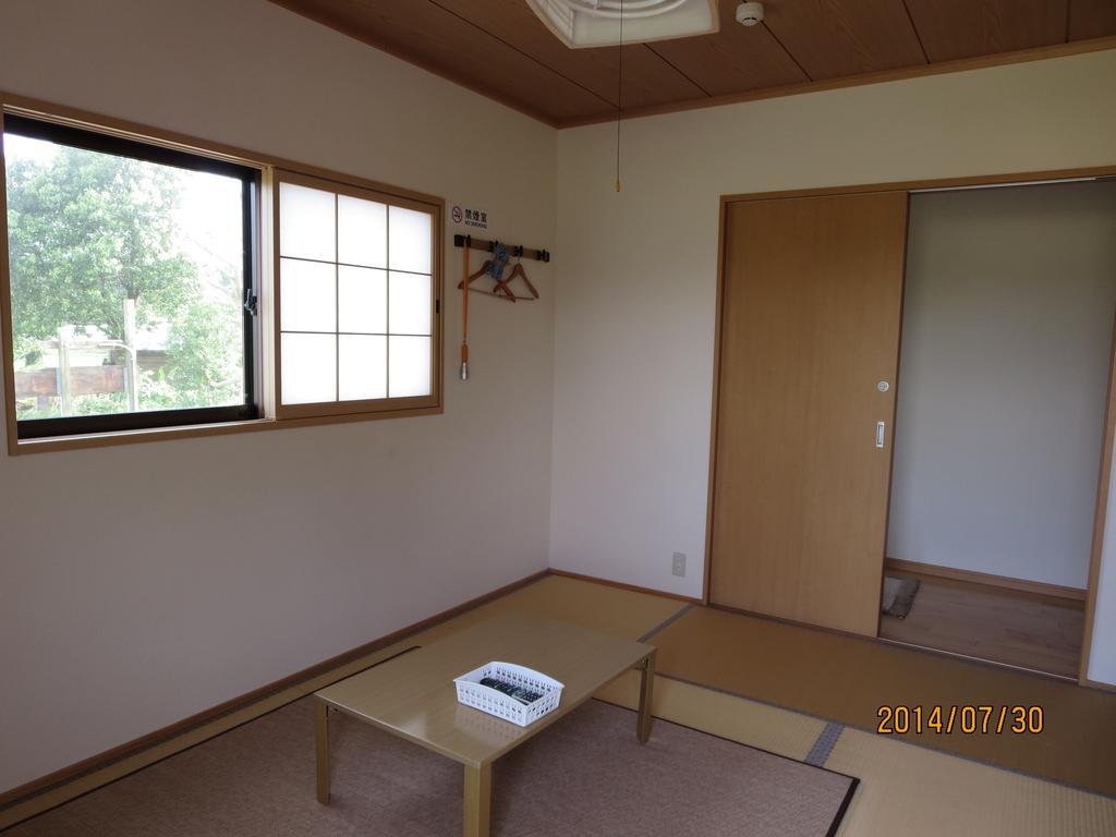 Guesthouse Suzukaze Shibushi Habitación foto